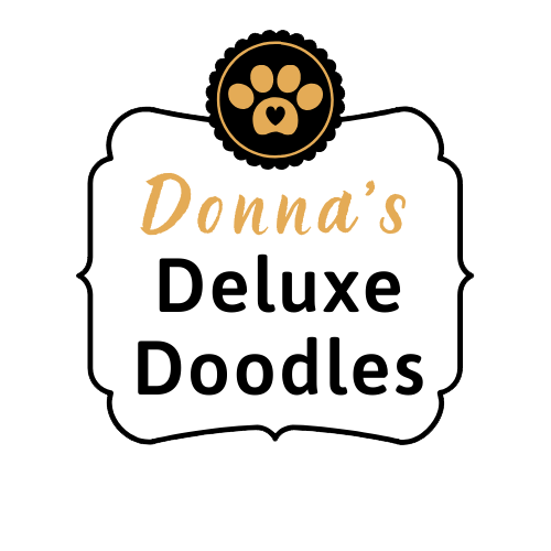 A logo for donna 's deluxe doodles with a paw print on it.