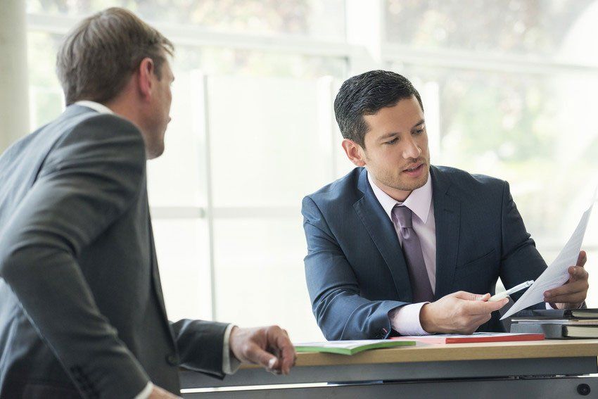 two solicitors in a discussion