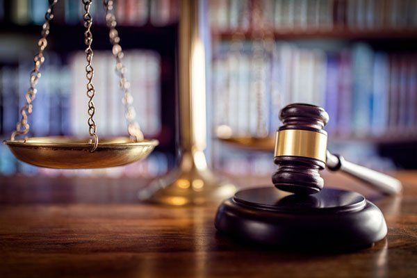 Auto and Truck Accident Attorney — Gavel and  Scales of Justice in Brunswick, GA