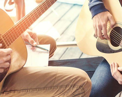 Used Guitars — Two Man Playing Guitar in Carlisle, PA Used Guitars — Two Man Playing Guitar in Carlisle, PA