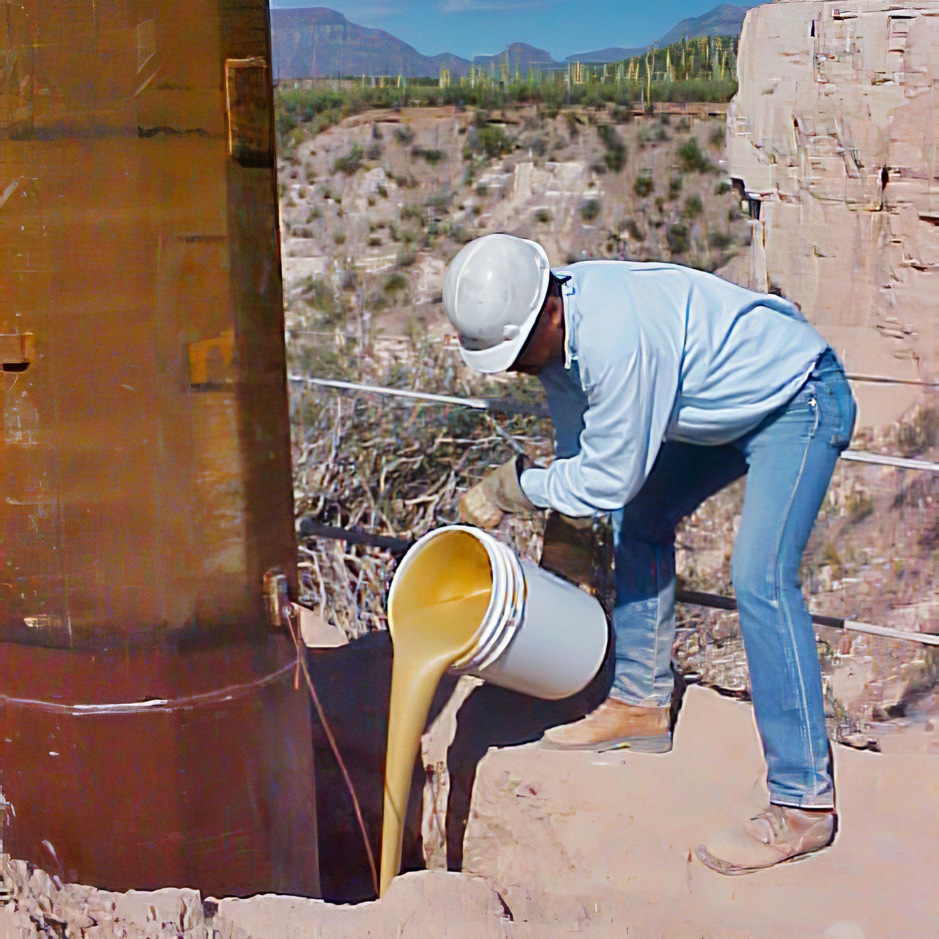 Secure Set being poured into a hole to set a utility pole