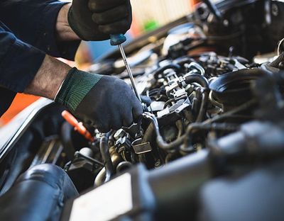 Car Repair — Auto Mechanic Repairing The Car in Kennett Square, PA Car Repair — Auto Mechanic Repairing The Car in Kennett Square, PA