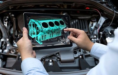 High-end Car Repair — Mechanic Checking The Car in Kennett Square, PA