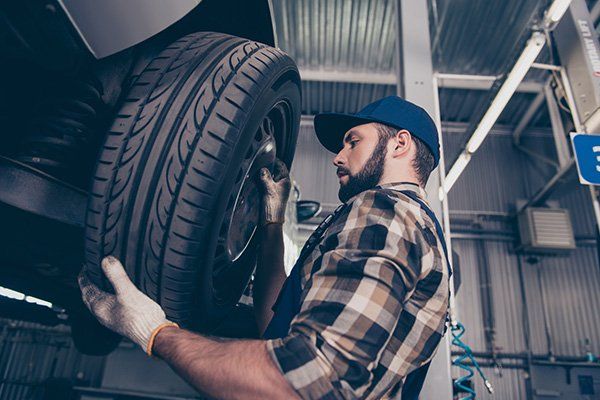 Tires — Technician Changing The Car Tires in Kennett Square, PA