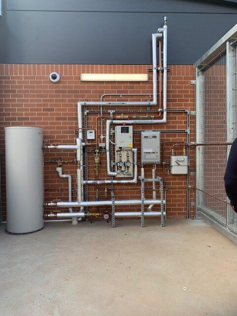 Pipes Of Hot Water System — Hogan Plumbing Group in Taree, NSW