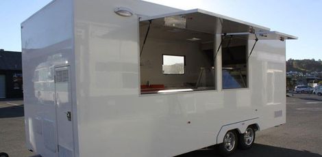 white caravan in a sunny day