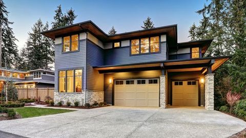 Modern House with Two Garage Doors — Okeechobee, FL — A Florida Door Sales