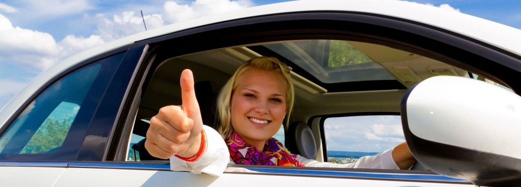 Lady gives the thumbs up after her radiator repair in Wellington