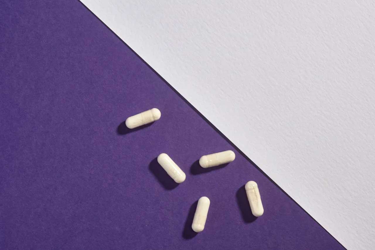 Pills On Purple Surface — Jacksonville, FL | Fulton Gibbs Wellness Pills On Purple Surface — Jacksonville, FL | Fulton Gibbs Wellness
