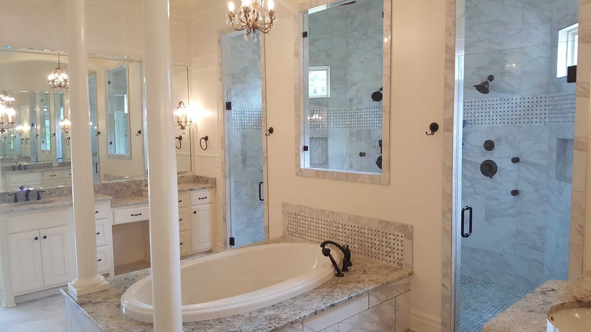 A bathroom with a tub , shower , sinks and mirrors.