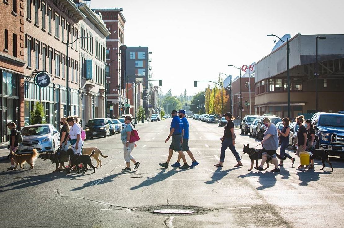 Group of people crossing the street in downtown Spokane
