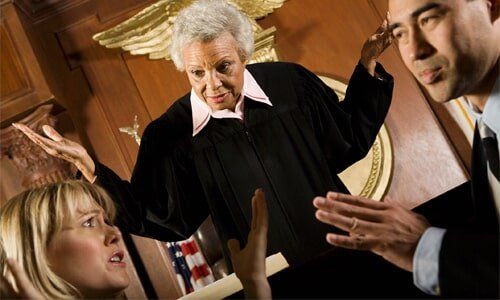 Couple arguing in front of a Judge — Divorce Attorneys in Youngstown, OH