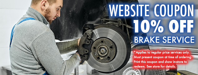 Mechanic working on car brake with text: 