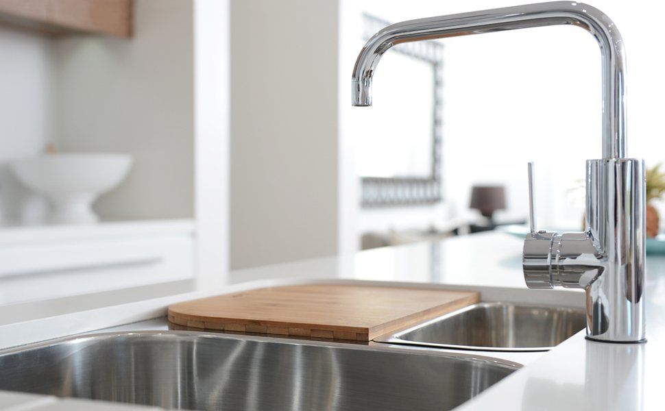 Stainless Steel Faucet And Sink — Worcester County, MA — Cassa Kitchen & Bath Design & Remodeling Center