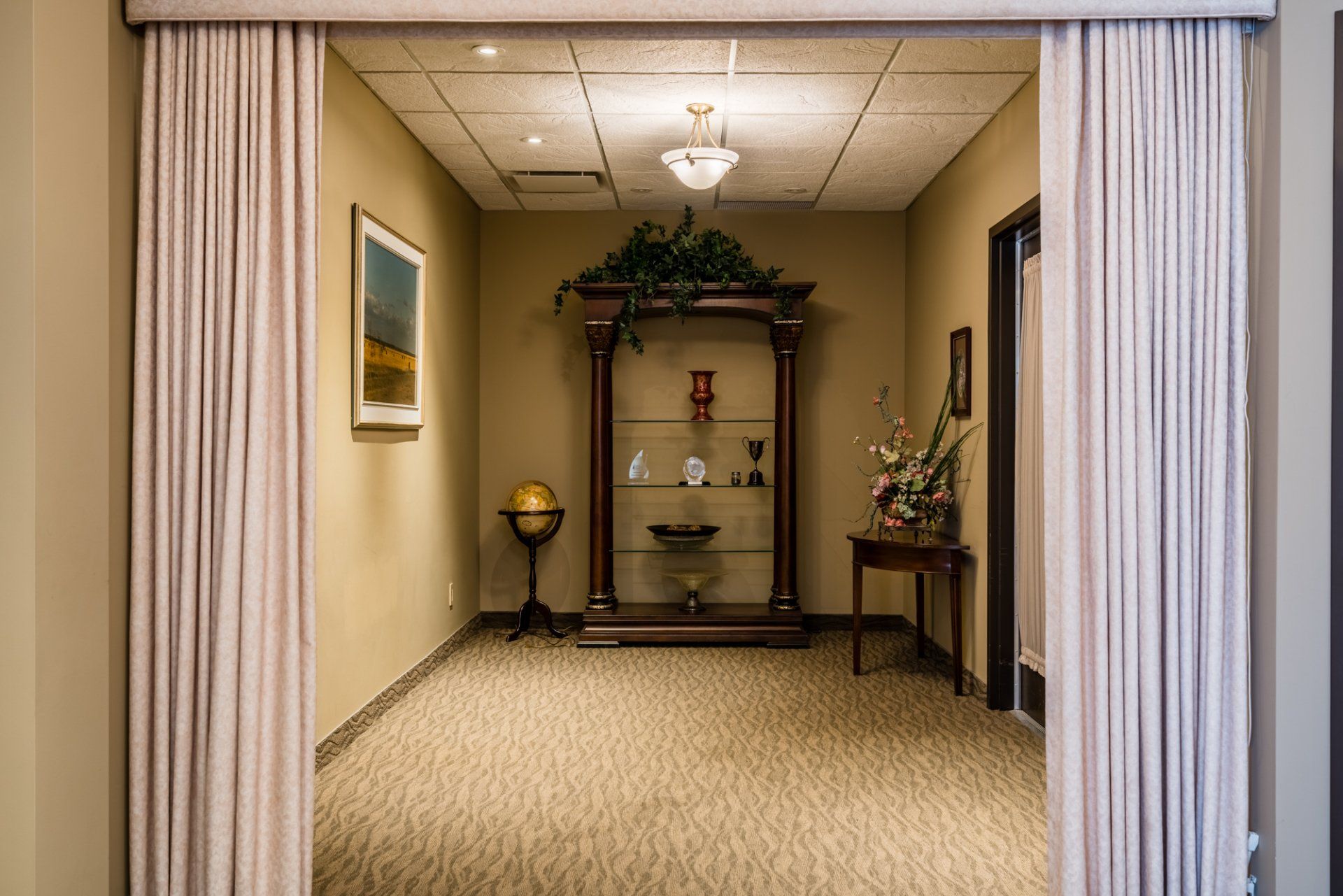 funeral centre room with a brown cabinet