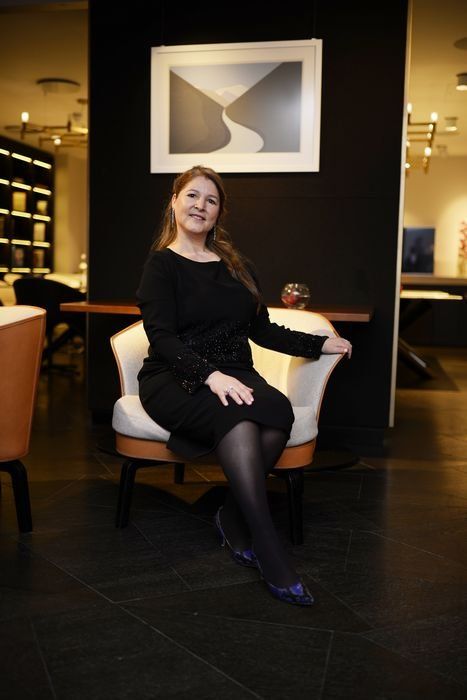 louisa beard on a chair