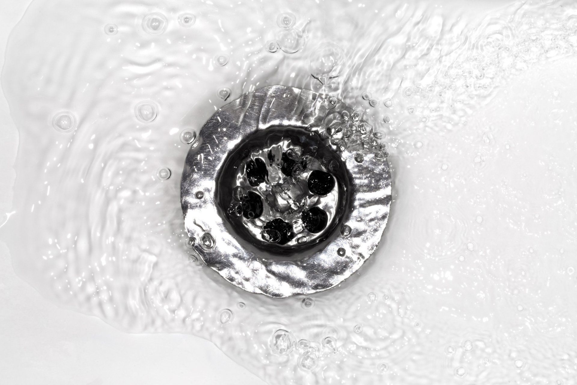 Bathroom Remodeling Plumbing — Water Flows Into a Sink In Macon, GA Bathroom Remodeling Plumbing — Water Flows Into a Sink In Macon, GA