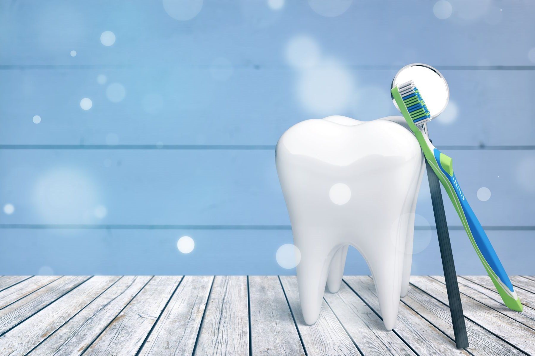 raffigurazione di un dente con spazzolino