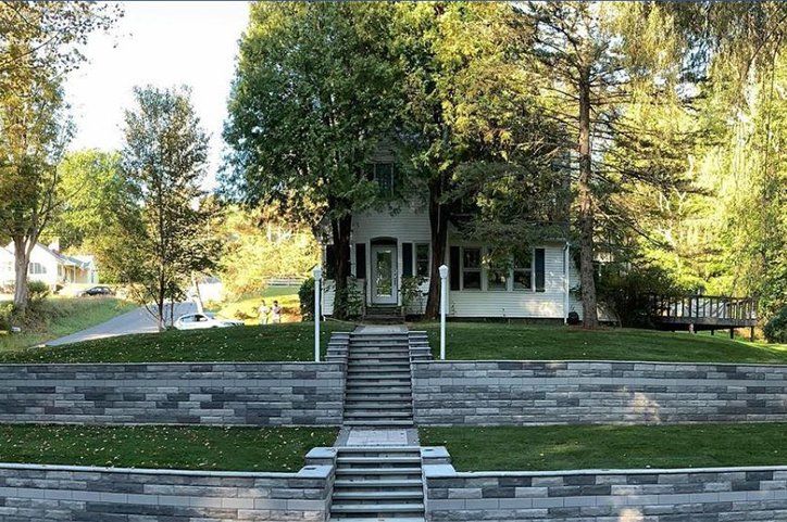 House with Retaining Walls — Pine Bush, NY — Creative Touch Landscaping & Home Improvement Inc.