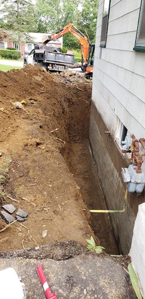 During Foundation Sealing — Pine Bush, NY — Creative Touch Landscaping & Home Improvement Inc.