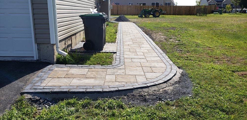 House with Walkway — Pine Bush, NY — Creative Touch Landscaping & Home Improvement Inc.