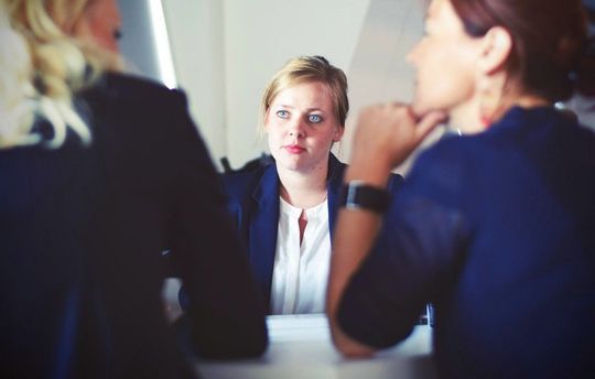 Counselor listening to patients