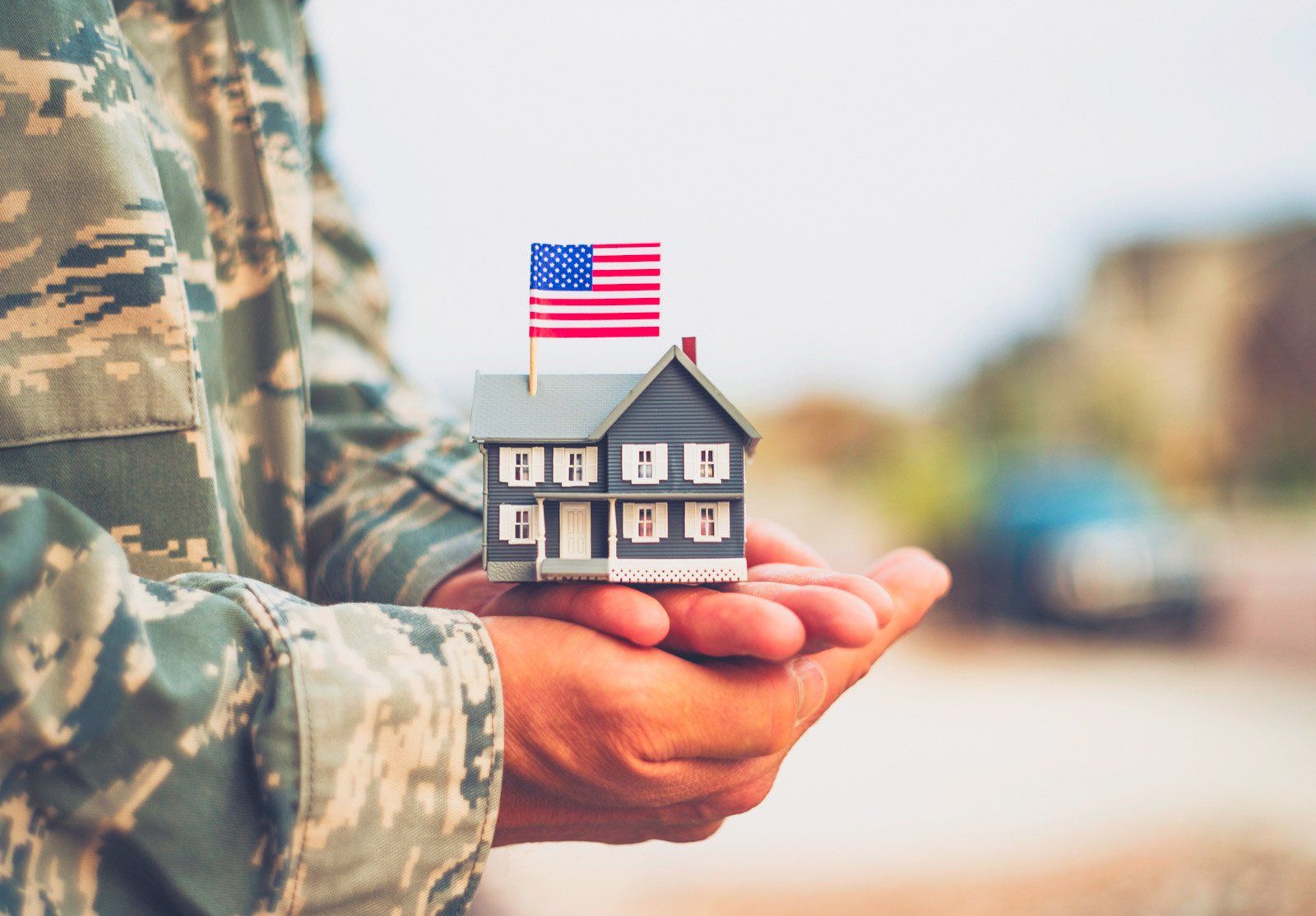Central Texas Property Management Soldier Holding a small house