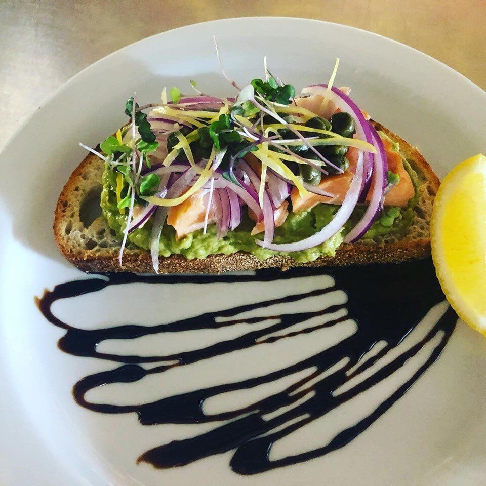 Smashed avocado & smoked salmon on sourdough - — Café & Bottle Shop Fingal Bay, QLD