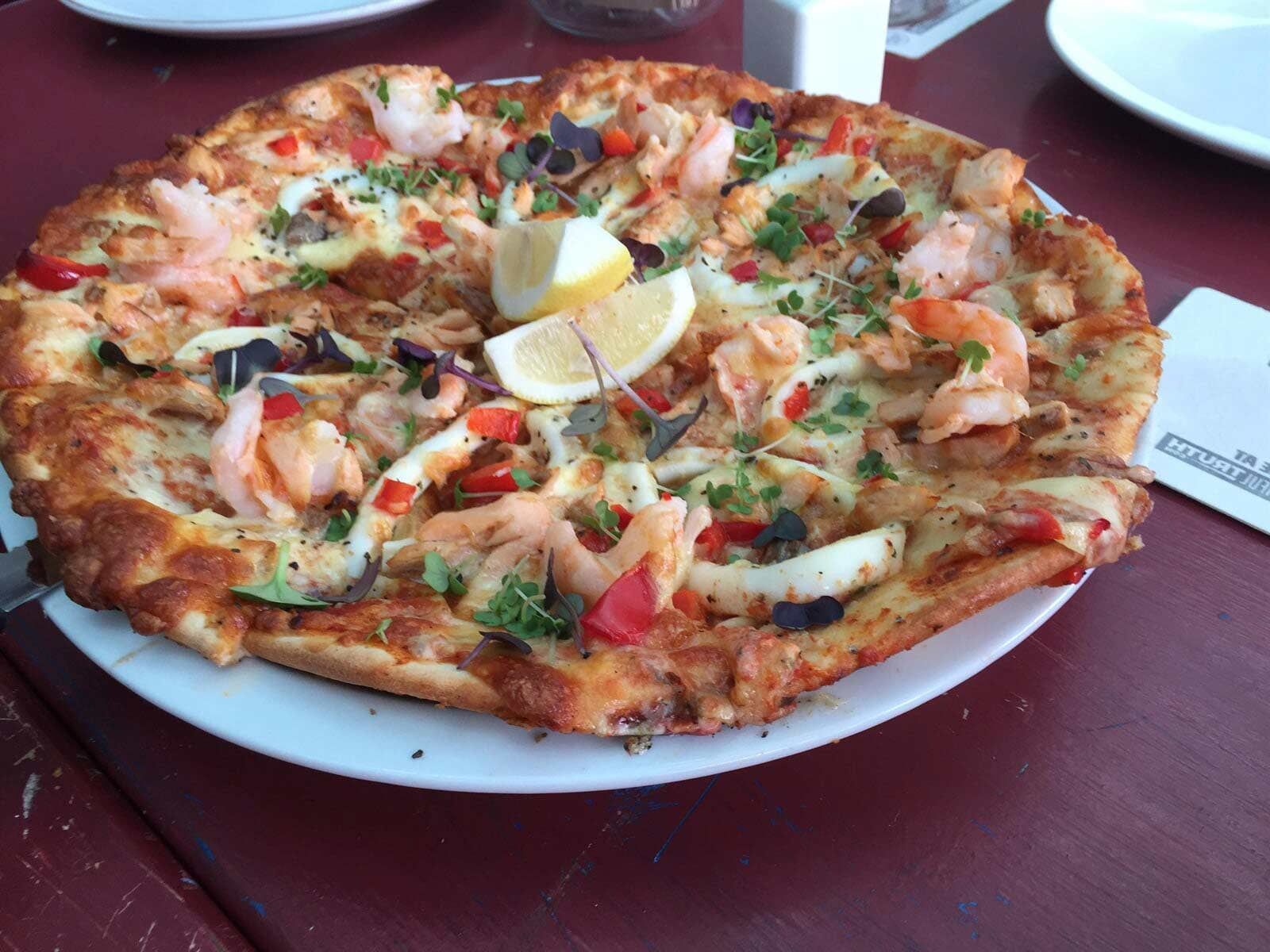 Prawn pizza — Café & Bottle Shop Fingal Bay, QLD