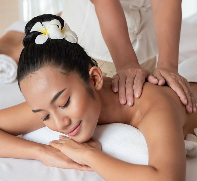 Woman Having Back Massage — Denver, CO — Individualized Massage Inc. Woman Having Back Massage — Denver, CO — Individualized Massage Inc.