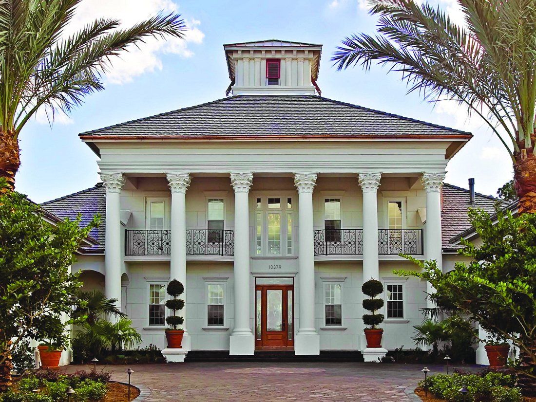 front of Woodlands, TX house with columns