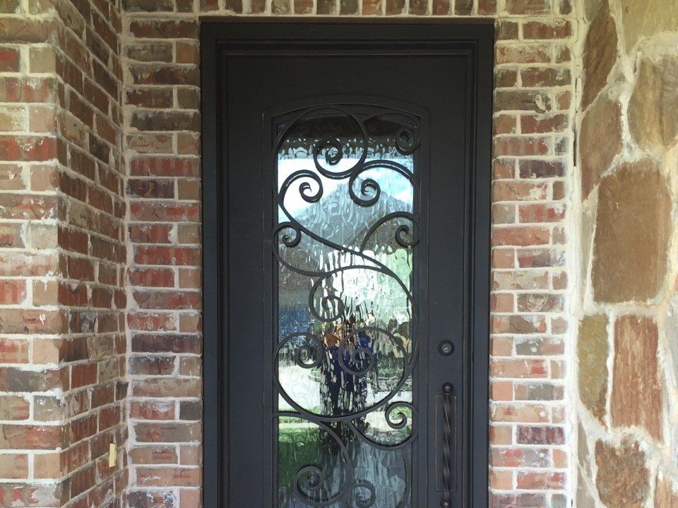 Exterior Iron Door with Accents