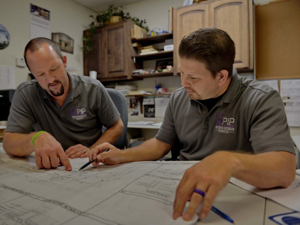Employees Work on Custom Drawings