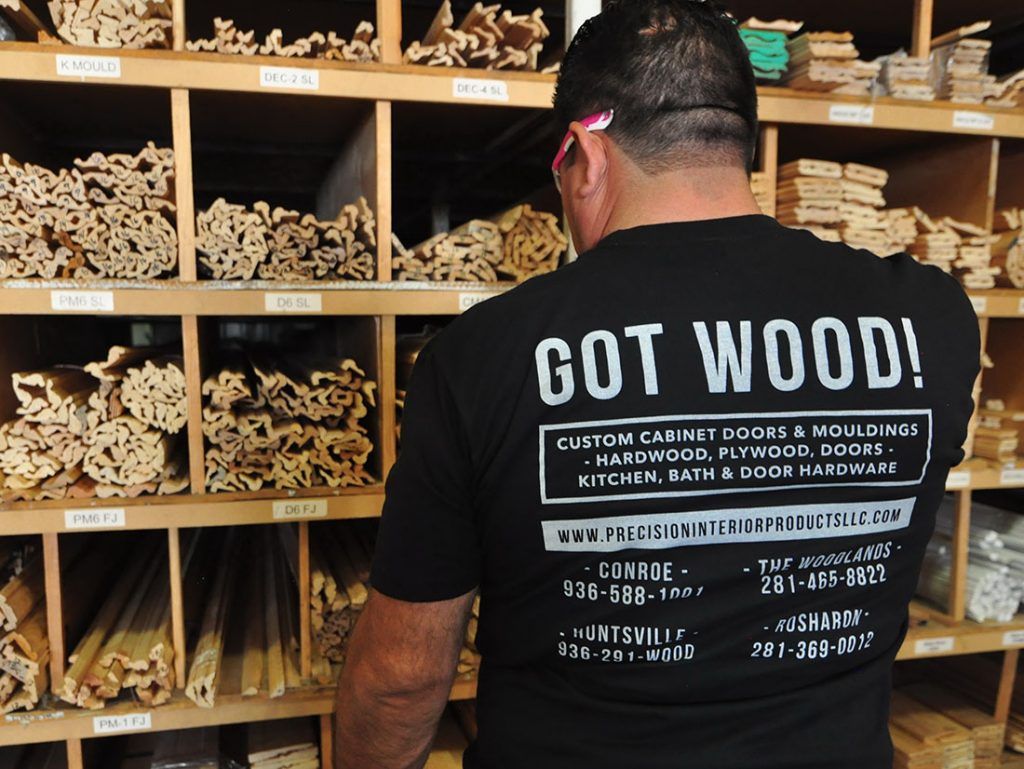Precision Interior Product's Worker in Wood Supply Area