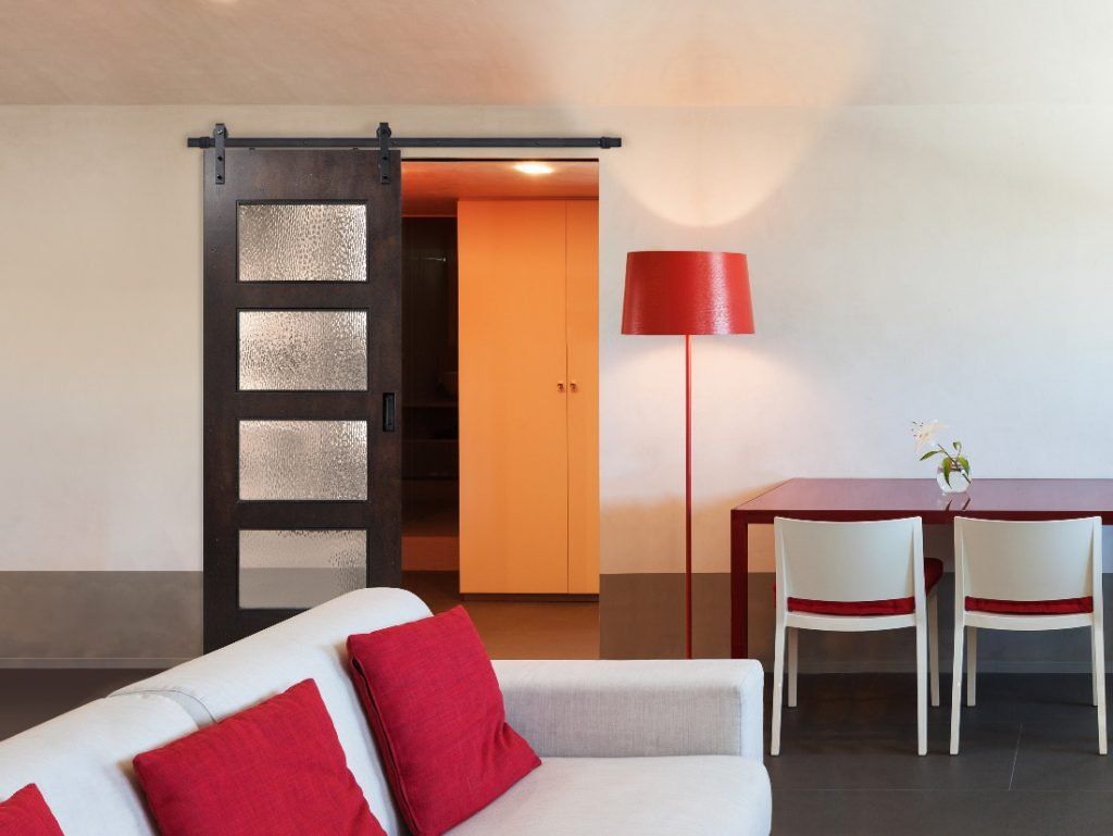 Sliding door with barn door hardware in Huntsville, TX