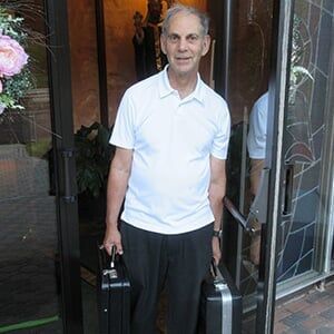 Ron Gordon With Attache Case — Fix a piano PA in Washington, PA Ron Gordon With Attache Case — Fix a piano PA in Washington, PA