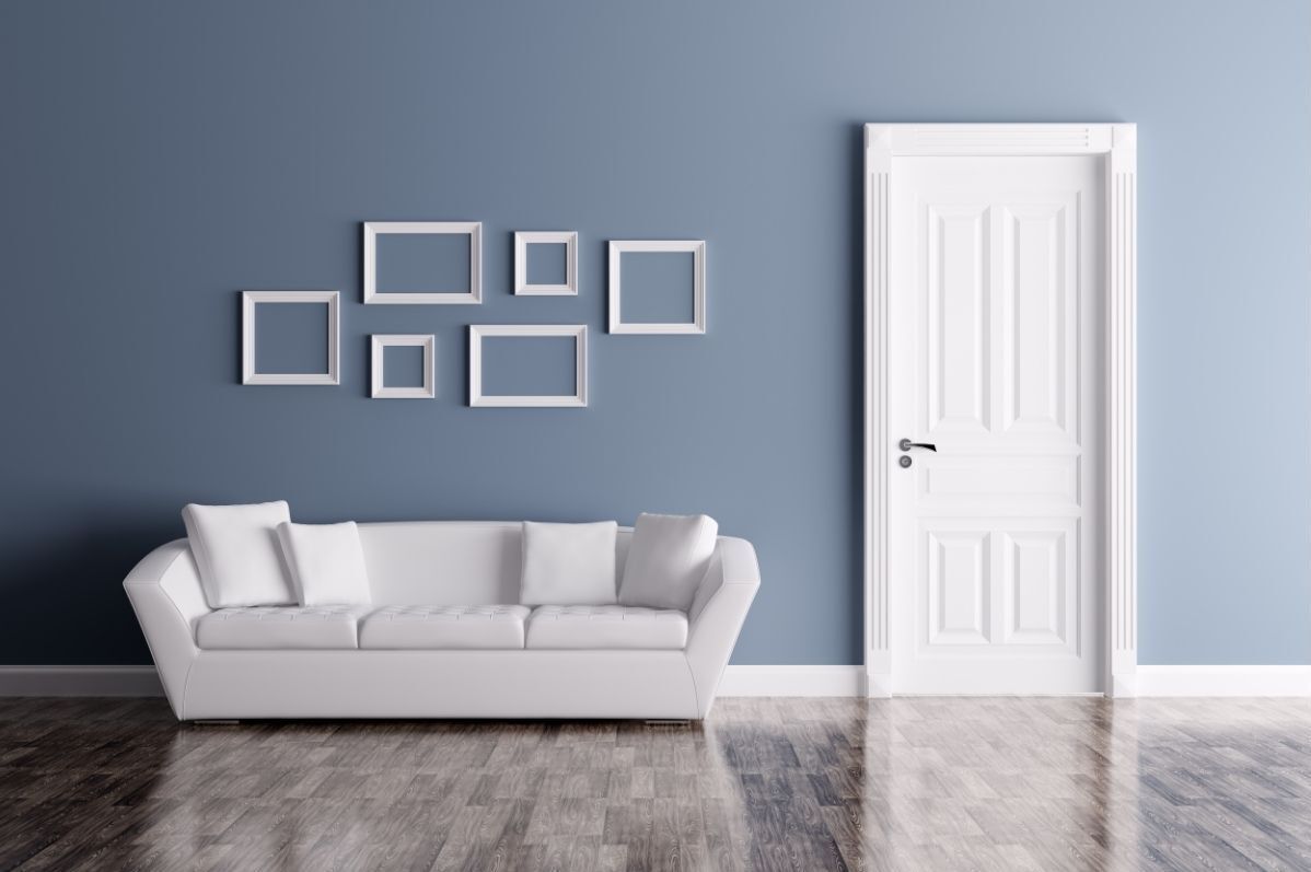 Blue painted wall, white painted door