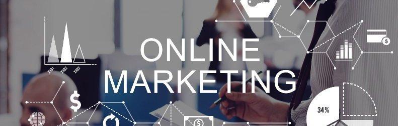 A man and woman are sitting in front of a screen that says `` online marketing ''.