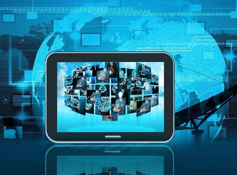 A tablet with a collage of pictures on the screen