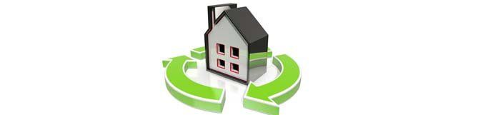 A house is surrounded by green arrows on a white background.
