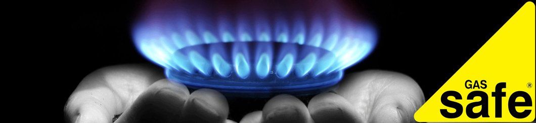 A picture of a gas burner with a yellow triangle that says gas safe