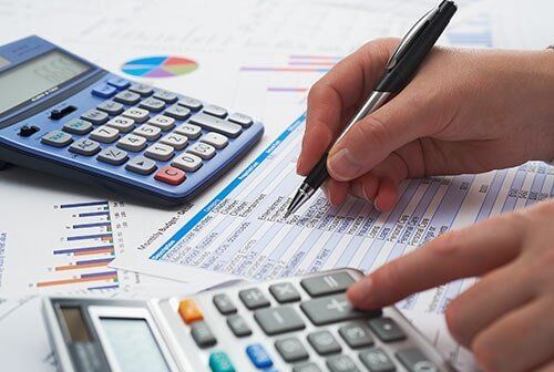 A Person Computing Monthly Budget — Wilmington, NC — Accounting By Jerry A Person Computing Monthly Budget — Wilmington, NC — Accounting By Jerry