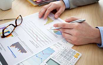 Accountant Analyzing Graph - Accountants in Rancho Cucamonga, CA Accountant Analyzing Graph - Accountants in Rancho Cucamonga, CA