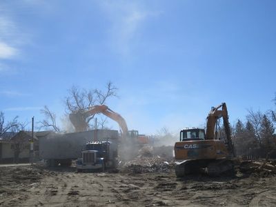 Picking up garbage - Demolition in Casper, WY Picking up garbage - Demolition in Casper, WY