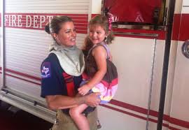 Woman carrying a happy girl - Medical personnel in Upland, CA Woman carrying a happy girl - Medical personnel in Upland, CA