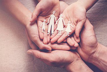 Hands Holding Paper Family Cutout — Dickson, TN — PFF Insurance