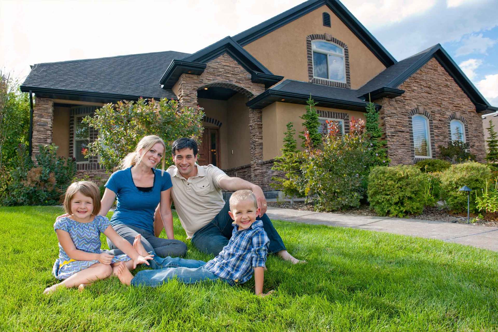 Homeowners Insurance — Family in Front of House in Venice, FL Homeowners Insurance — Family in Front of House in Venice, FL