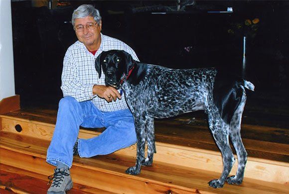 Homeowner Insurance Sarasota — Russ Gifford and His Dog in Venice, FL Homeowner Insurance Sarasota — Russ Gifford and His Dog in Venice, FL