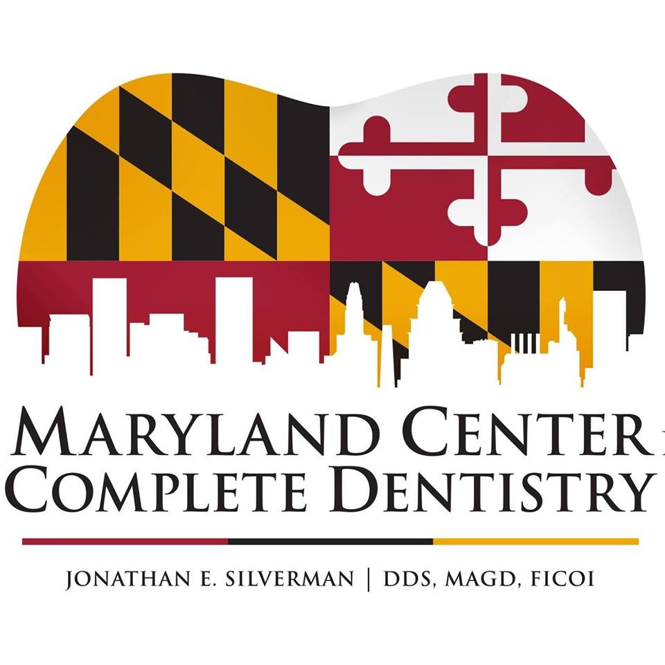 Logo for Maryland Center for Complete Dentistry, featuring the state flag colors and a skyline silhouette.