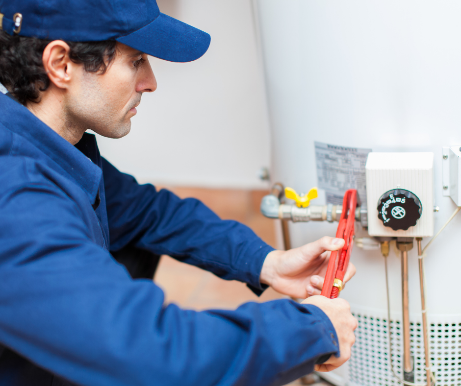 plumber repairing a water heater